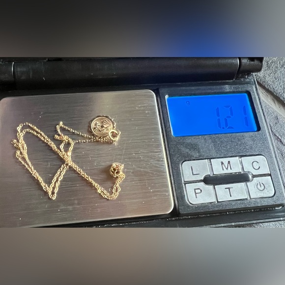 Hallmarked 10k yellow gold pendant and 10k yellow gold chain . - Picture 11 of 11